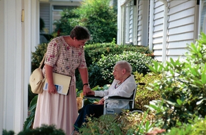 OSF Hospice volunteer with patient